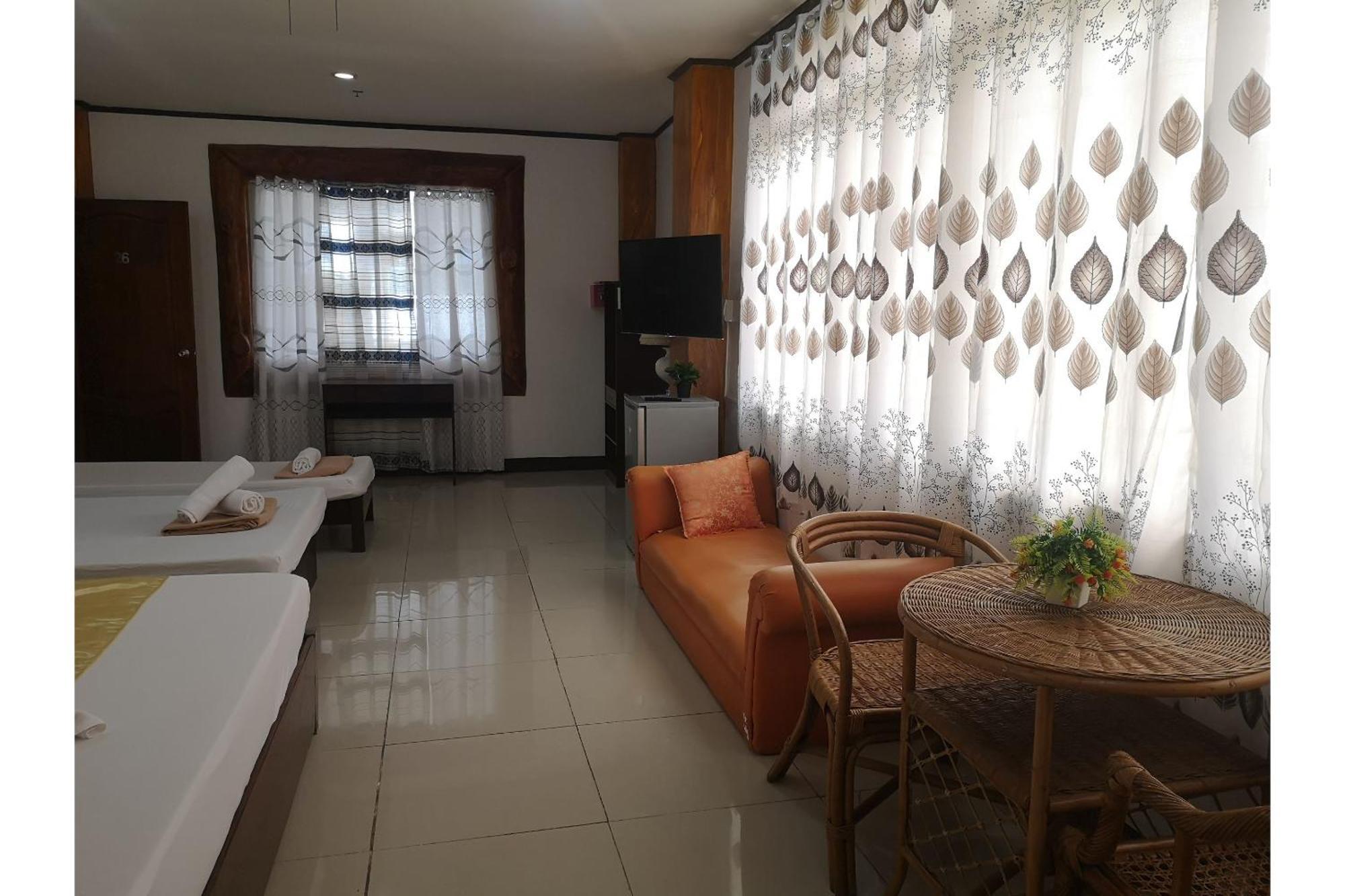 Oyo 880 Flores De Musa Inn بويرتو برينسيسا المظهر الخارجي الصورة