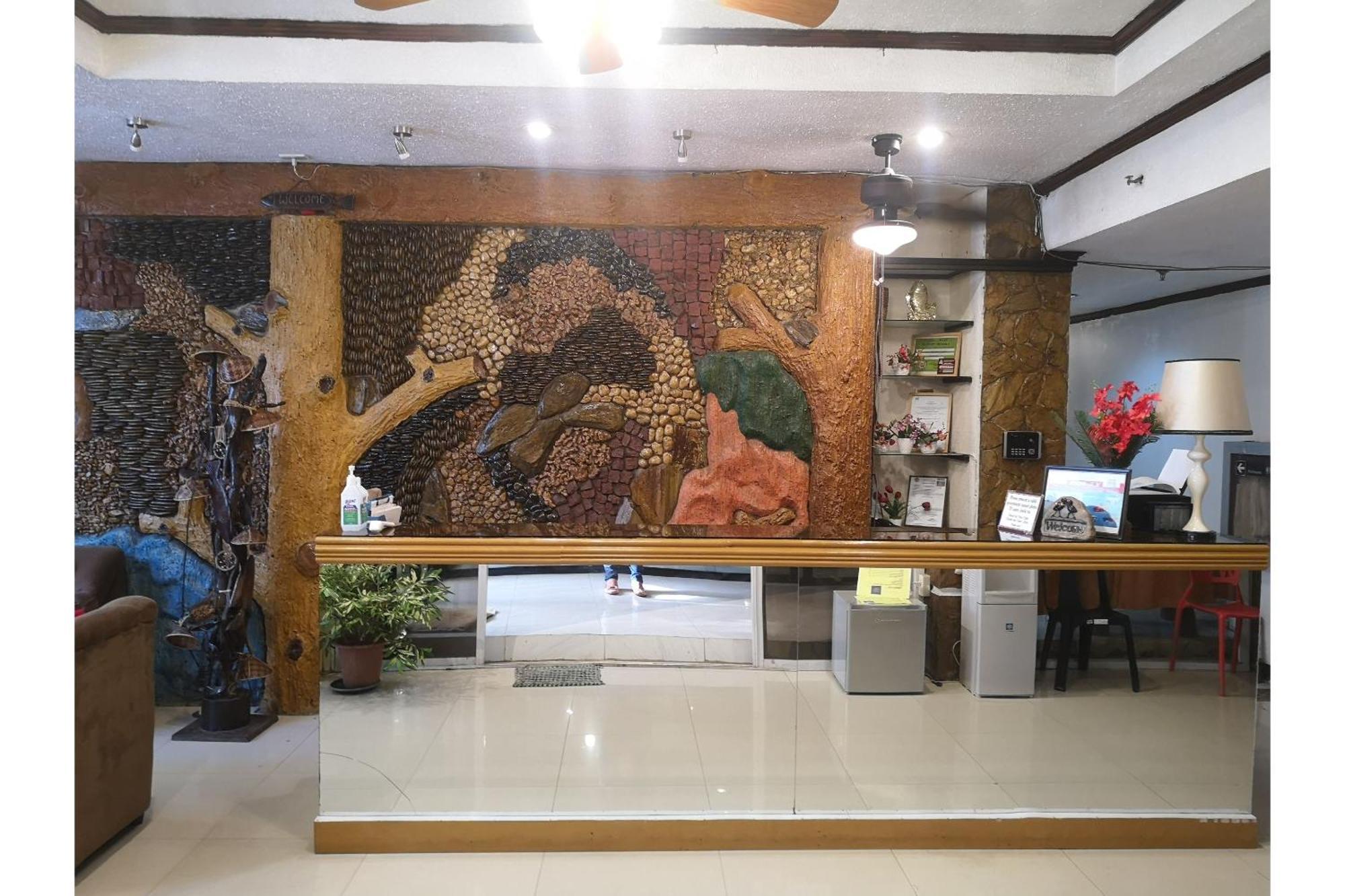 Oyo 880 Flores De Musa Inn بويرتو برينسيسا المظهر الخارجي الصورة