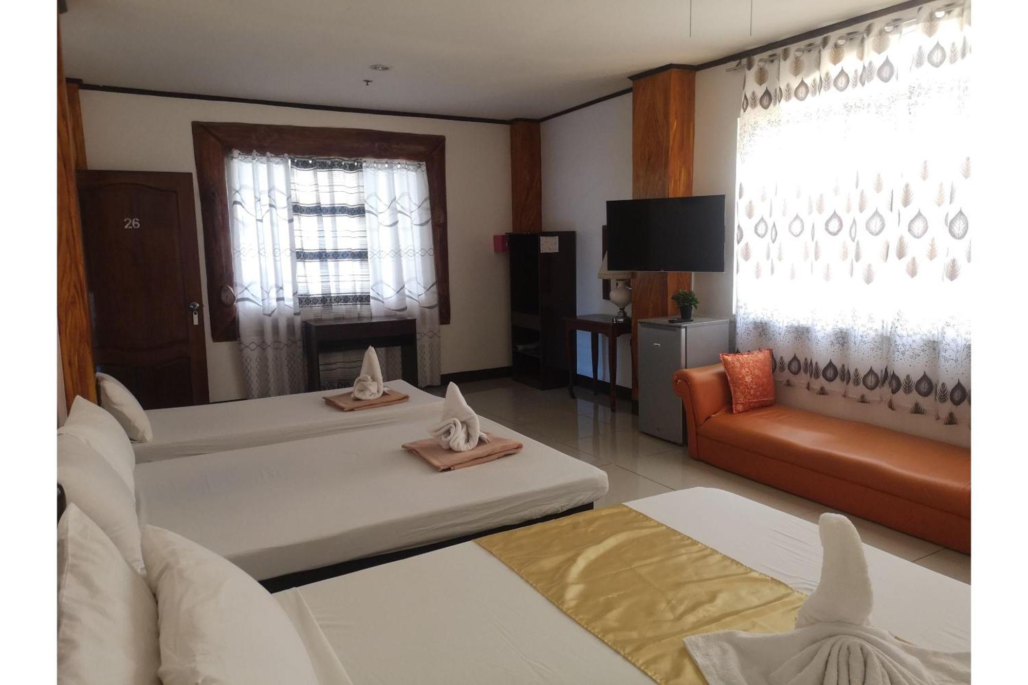 Oyo 880 Flores De Musa Inn بويرتو برينسيسا المظهر الخارجي الصورة