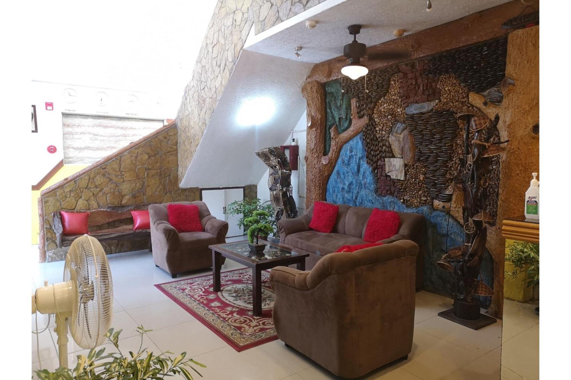 Oyo 880 Flores De Musa Inn بويرتو برينسيسا المظهر الخارجي الصورة