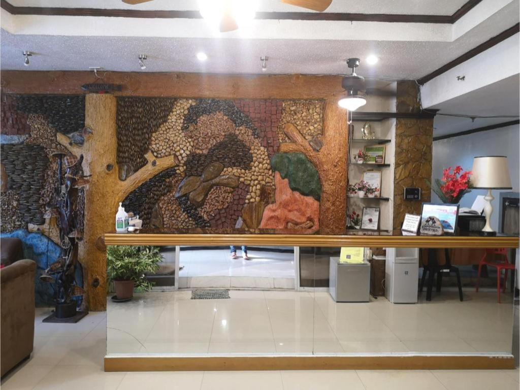 Oyo 880 Flores De Musa Inn بويرتو برينسيسا المظهر الخارجي الصورة