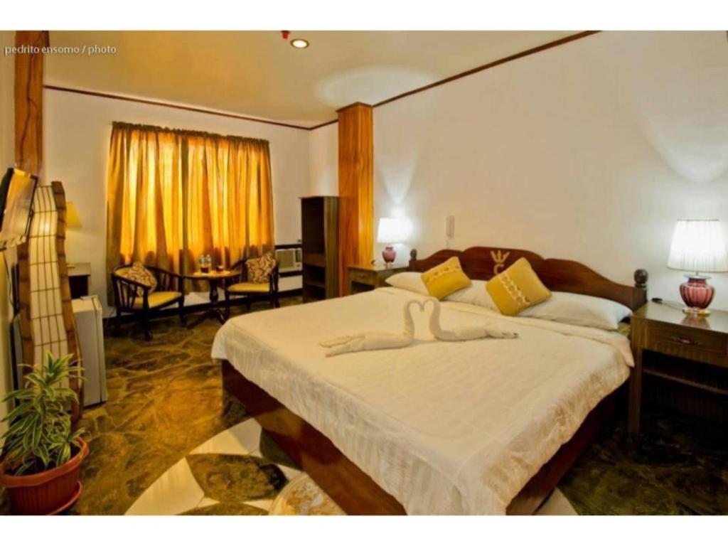 Oyo 880 Flores De Musa Inn بويرتو برينسيسا المظهر الخارجي الصورة