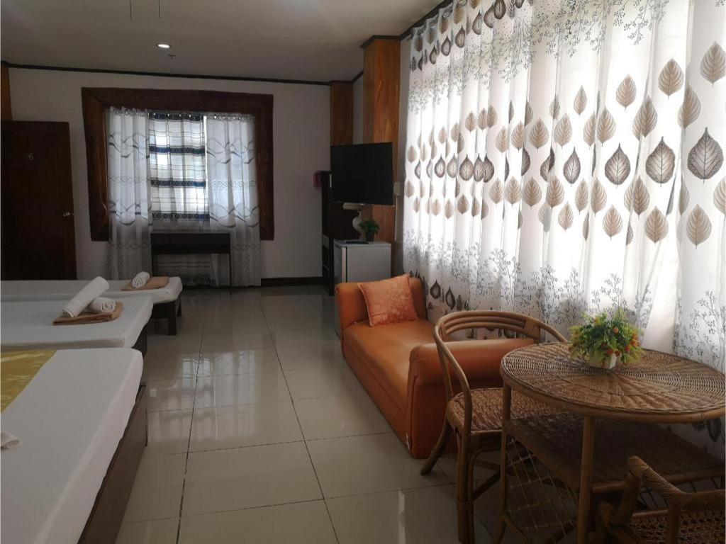 Oyo 880 Flores De Musa Inn بويرتو برينسيسا المظهر الخارجي الصورة