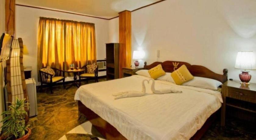 Oyo 880 Flores De Musa Inn بويرتو برينسيسا المظهر الخارجي الصورة