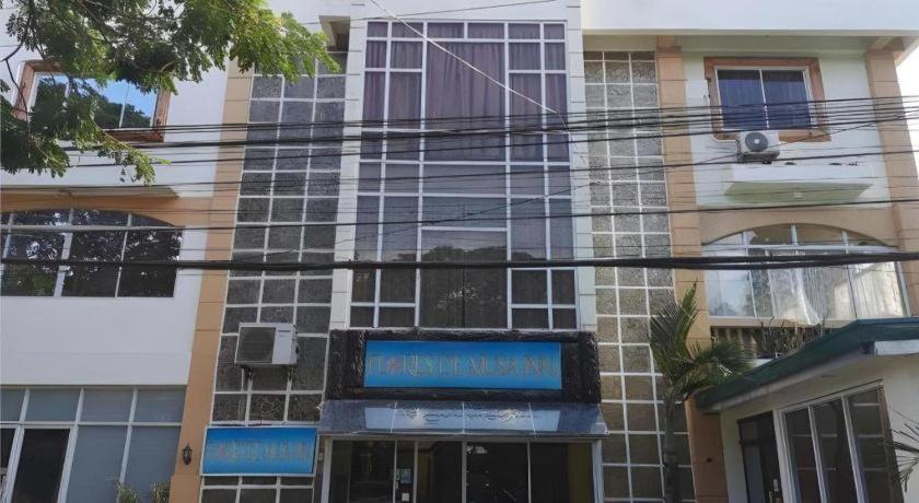 Oyo 880 Flores De Musa Inn بويرتو برينسيسا المظهر الخارجي الصورة