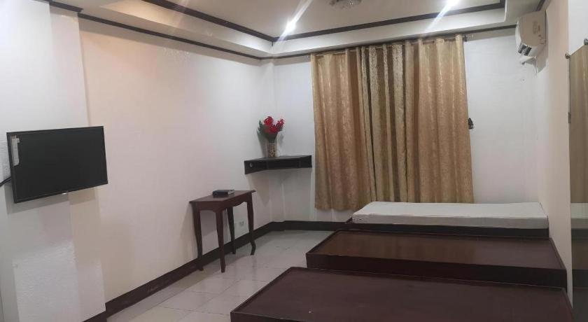 Oyo 880 Flores De Musa Inn بويرتو برينسيسا المظهر الخارجي الصورة