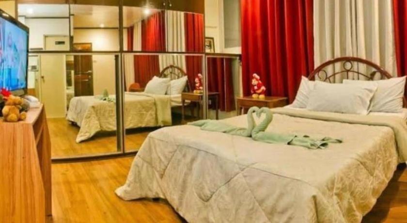 Oyo 880 Flores De Musa Inn بويرتو برينسيسا المظهر الخارجي الصورة