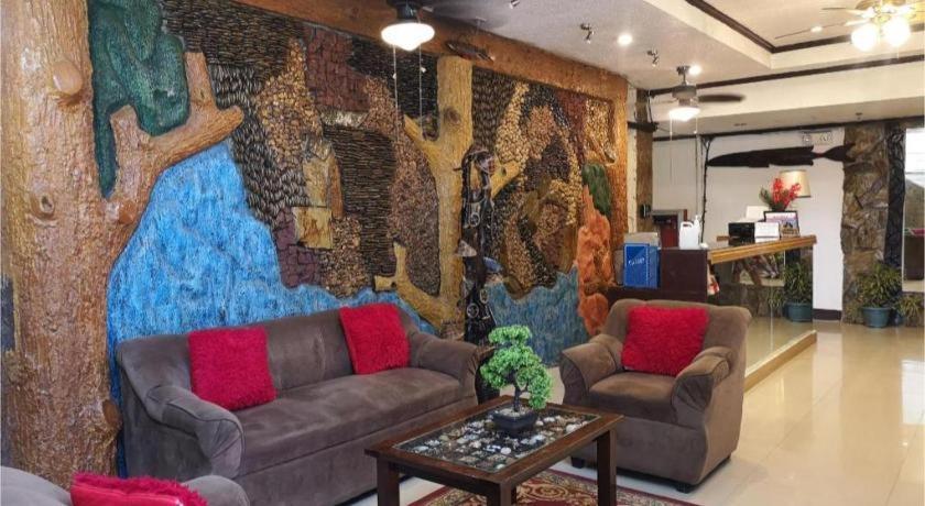 Oyo 880 Flores De Musa Inn بويرتو برينسيسا المظهر الخارجي الصورة