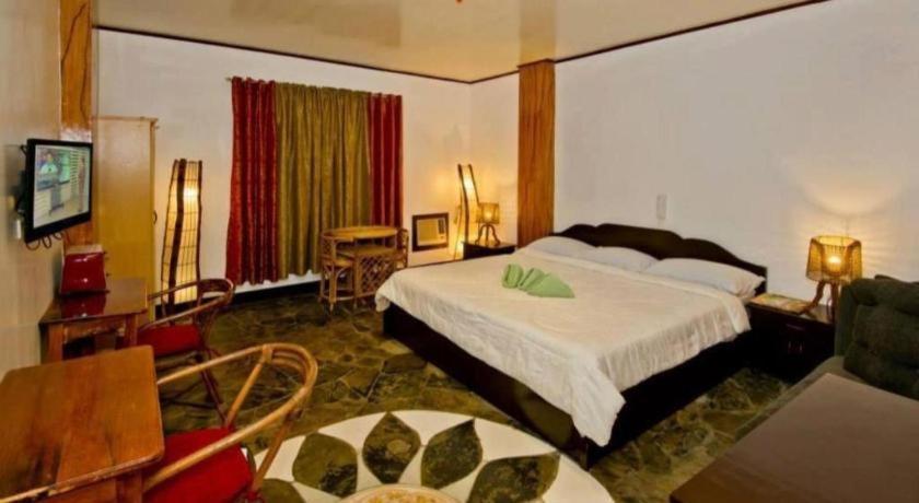 Oyo 880 Flores De Musa Inn بويرتو برينسيسا المظهر الخارجي الصورة